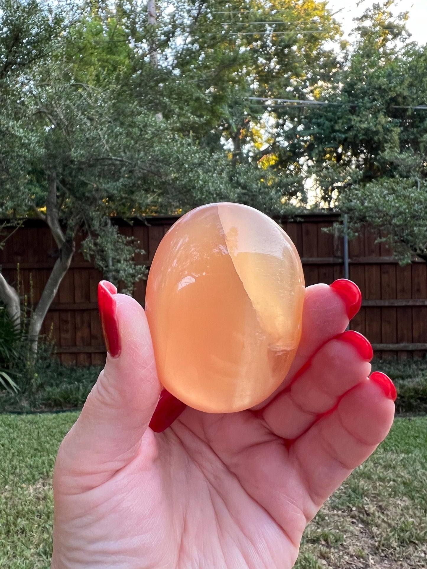 Honey Calcite Palm Stone, 2.25”, beautiful carving, high-frequency crystals