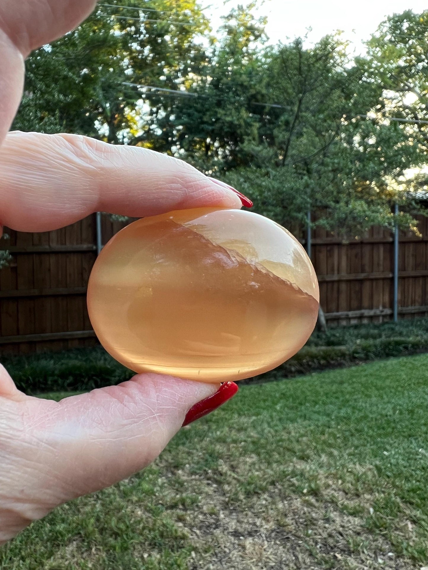 Honey Calcite Palm Stone, 2.25”, beautiful carving, high-frequency crystals